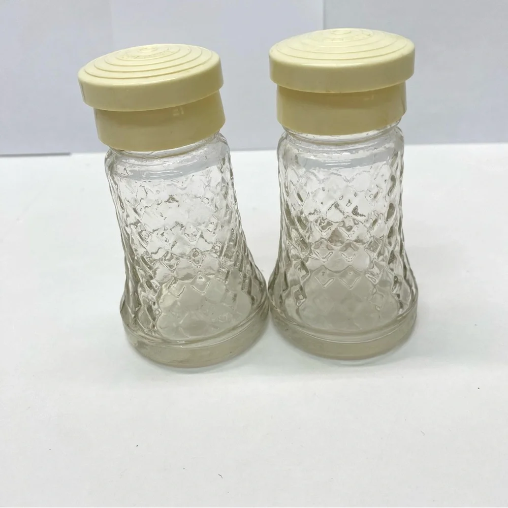 Vintage Daniells Salt and Pepper Shakers Set Beige Top Glass Bottom Plastic Tops